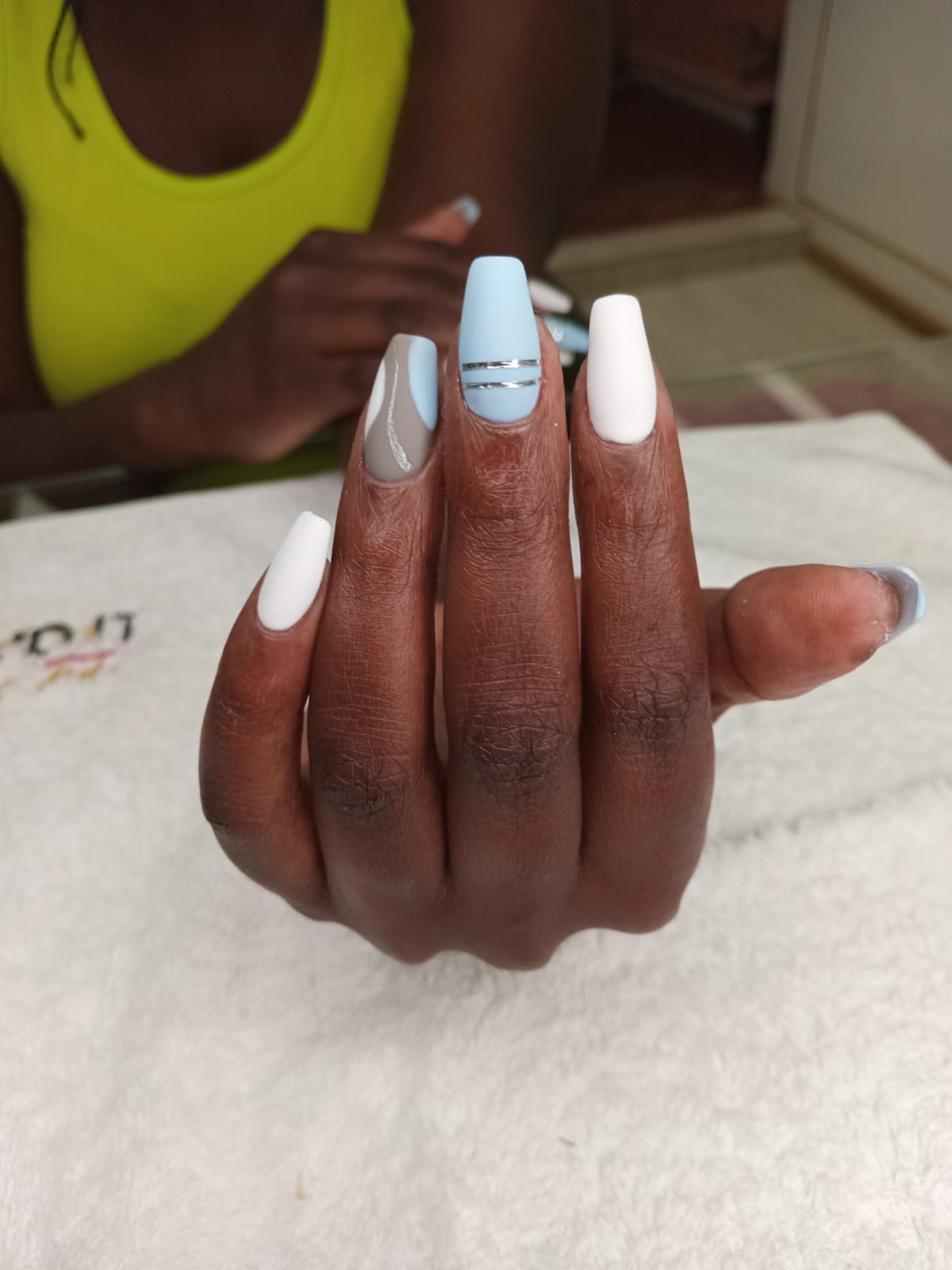 Matte baby blue, white and grey coffin nails with silver line art by Laira Touch